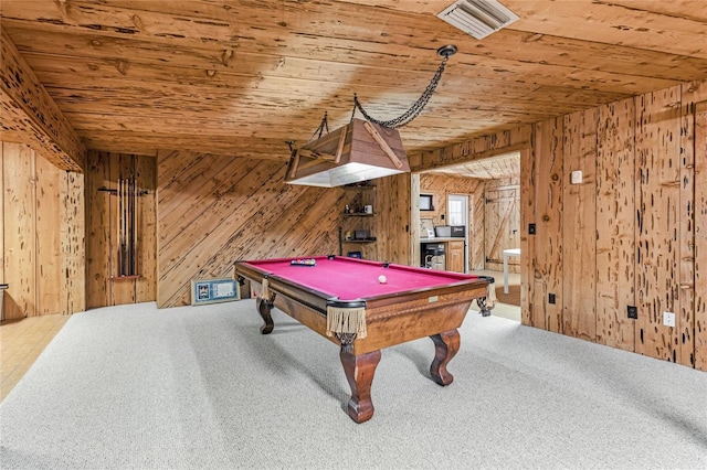 recreation room featuring wood ceiling, wood walls, and carpet floors