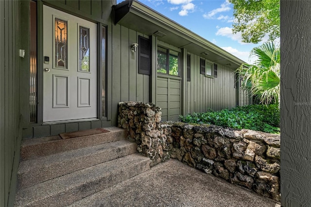 entrance to property with board and batten siding