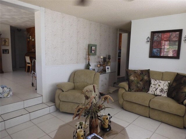 tiled living room with a textured ceiling