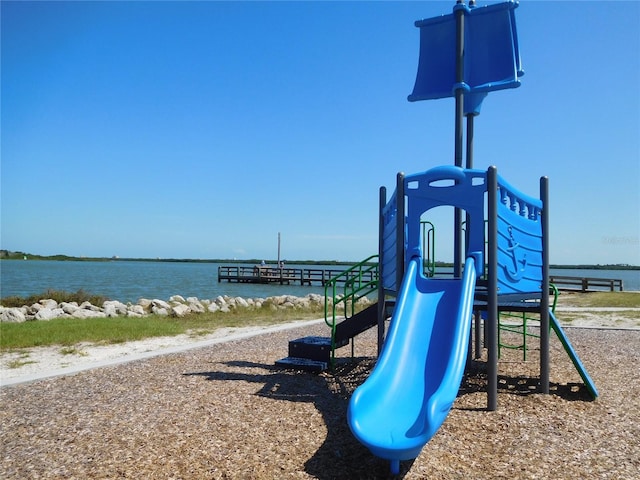 community playground with a water view