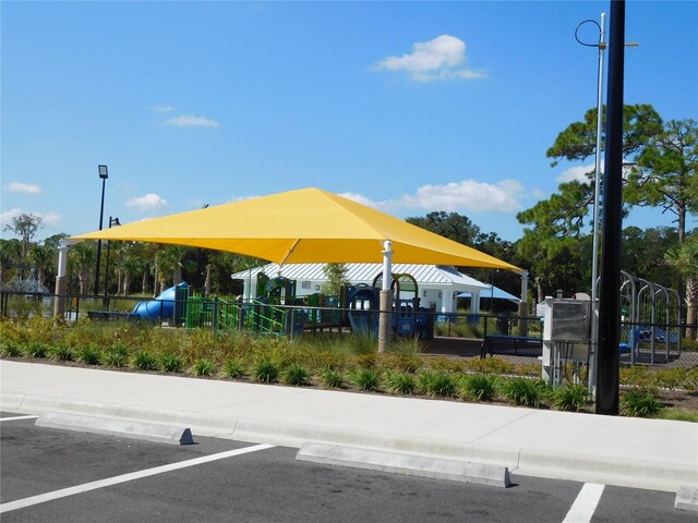uncovered parking lot with fence