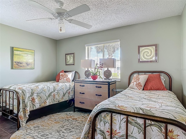 31 Sea Harbor Dr E, Ormond Beach, FL 32176 - bedroom with a textured ceiling and ceiling fan