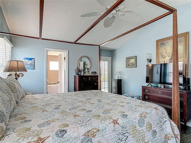 31 Sea Harbor Dr E, Ormond Beach, FL 32176 - bedroom with lofted ceiling, multiple windows, a textured ceiling, ensuite bath, and ceiling fan