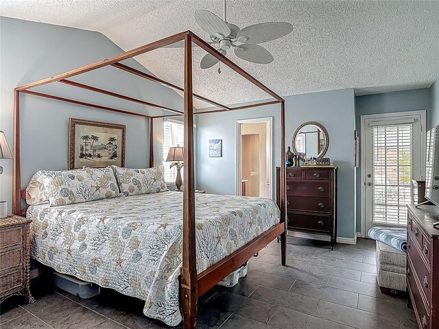 31 Sea Harbor Dr E, Ormond Beach, FL 32176 - bedroom featuring lofted ceiling, a textured ceiling, access to outside, a ceiling fan, and baseboards
