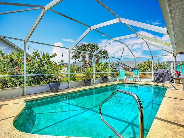 31 Sea Harbor Dr E, Ormond Beach, FL 32176 - outdoor pool with a patio area and a lanai