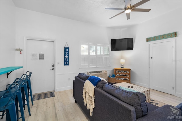 3509 S Atlantic Ave Unit 102And 103, New Smyrna Beach, FL 32169 - living area with a ceiling fan, light wood-style flooring, and baseboards
