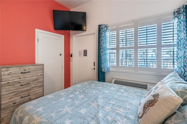 3509 S Atlantic Ave Unit 102And 103, New Smyrna Beach, FL 32169 - bedroom with multiple windows, lofted ceiling, and an AC wall unit