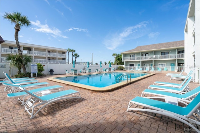 3509 S Atlantic Ave Unit 102And 103, New Smyrna Beach, FL 32169 - community pool featuring fence and a patio area