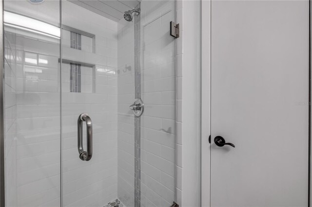 bathroom featuring a stall shower