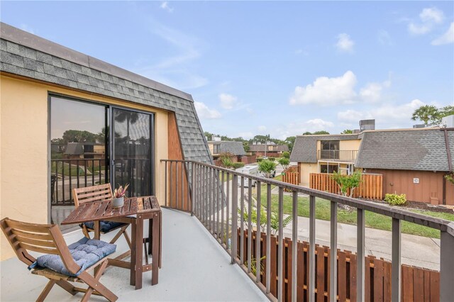 balcony featuring a residential view