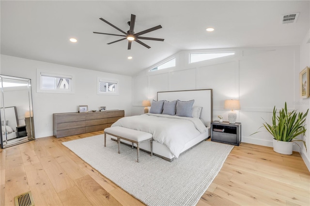 bedroom with vaulted ceiling, wood finished floors, ceiling fan, and recessed lighting