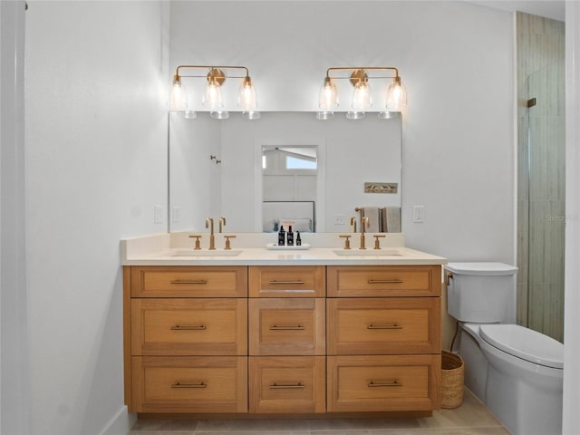 bathroom featuring toilet, double vanity, tile patterned flooring, and a shower