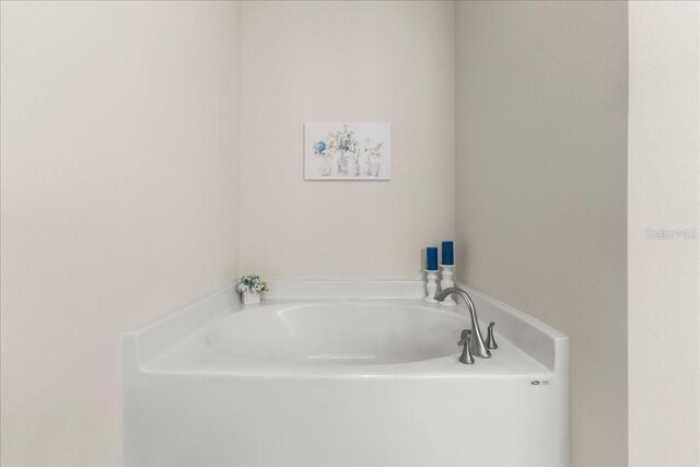 full bath featuring a garden tub