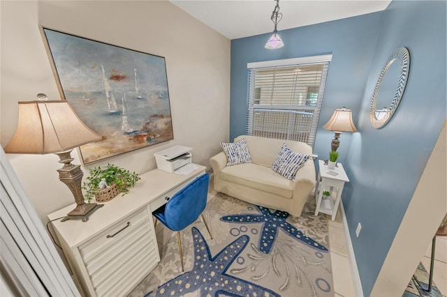 home office featuring tile patterned flooring and baseboards