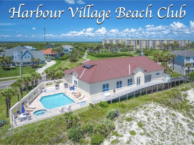 drone / aerial view of a pool area
