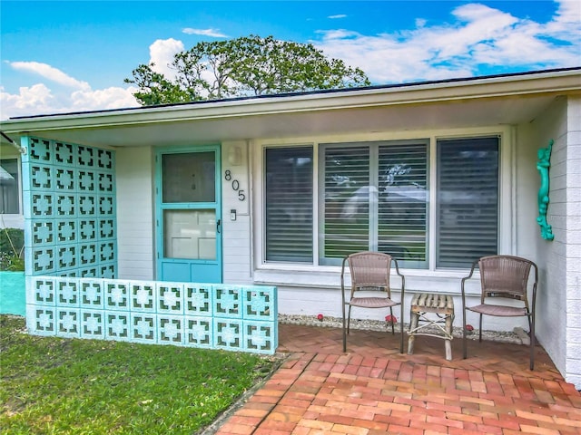 entrance to property with covered porch