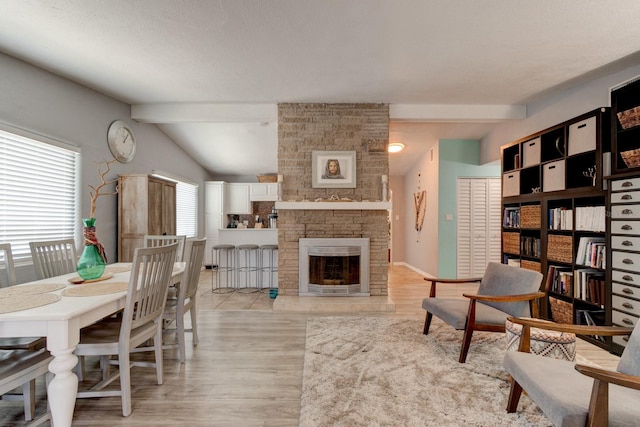 184 Azalea Rd, Edgewater, FL 32141 - dining space with wood finished floors and a large fireplace