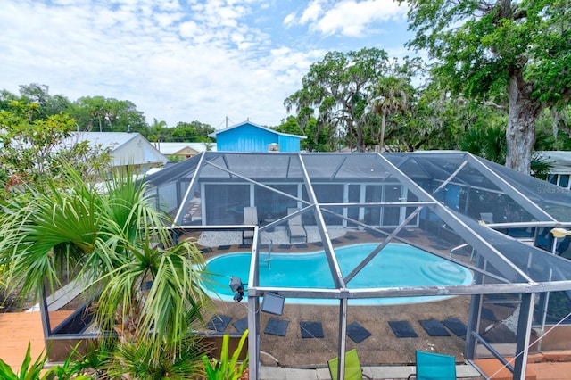 184 Azalea Rd, Edgewater, FL 32141 - swimming pool featuring a lanai and a patio