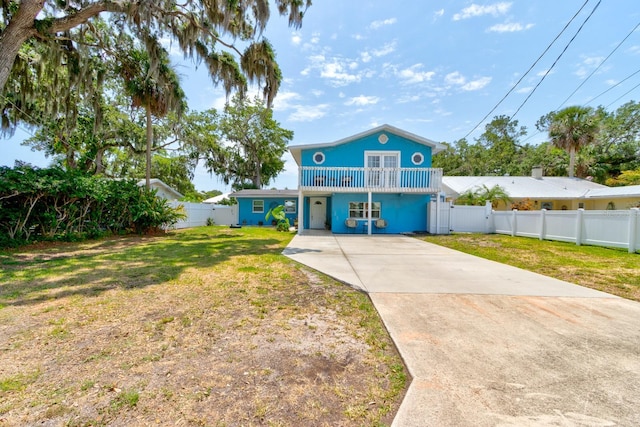 184 Azalea Rd, Edgewater, FL 32141 - coastal home featuring concrete driveway and a balcony