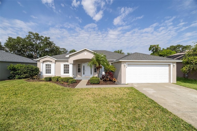 404 Central Mariners Dr, Edgewater, FL 32141 - ranch-style house featuring stucco siding, an attached garage, driveway, and a front yard