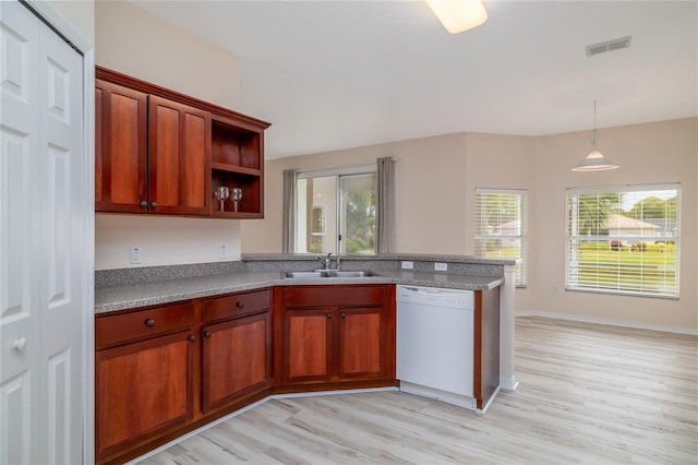 404 Central Mariners Dr, Edgewater, FL 32141 - kitchen featuring white dishwasher, a sink, a peninsula, open shelves, and light wood-style flooring