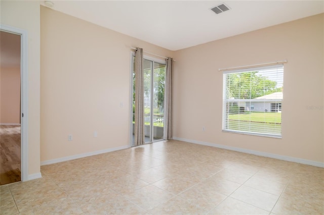404 Central Mariners Dr, Edgewater, FL 32141 - empty room featuring light tile patterned floors and baseboards