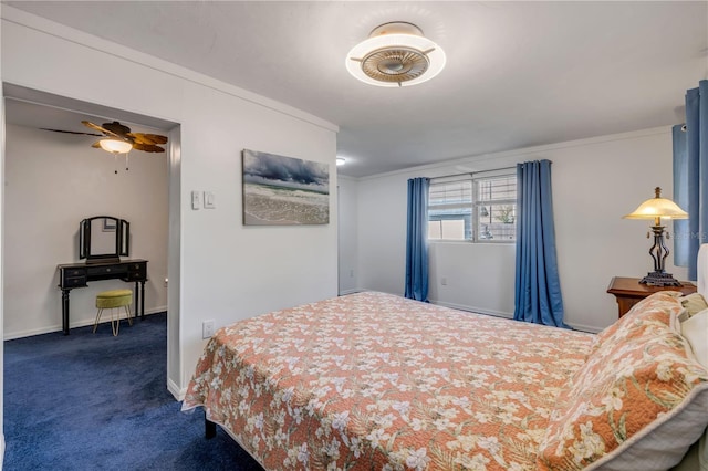 bedroom featuring dark colored carpet, baseboards, and ornamental molding