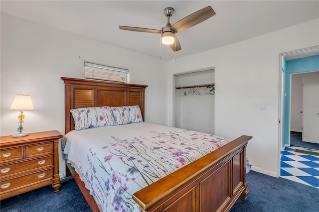 bedroom featuring dark colored carpet, a closet, ceiling fan, and baseboards