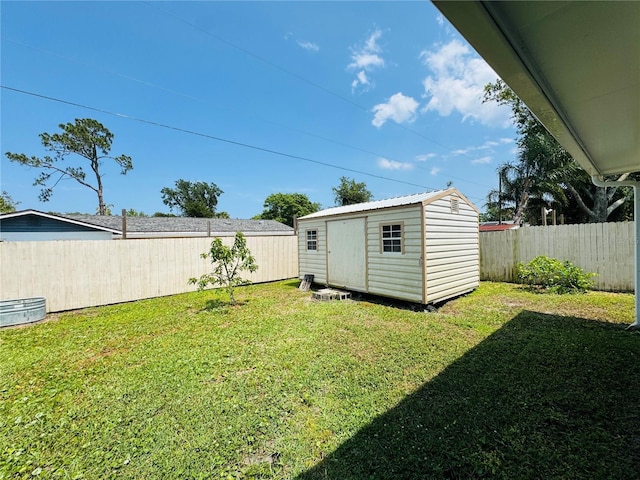 3303 Victory Palm Dr, Edgewater, FL 32141 - view of yard with a storage unit and an outdoor structure