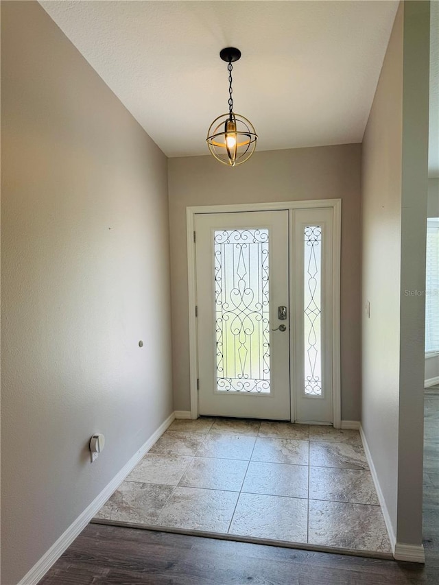 3303 Victory Palm Dr, Edgewater, FL 32141 - foyer featuring baseboards