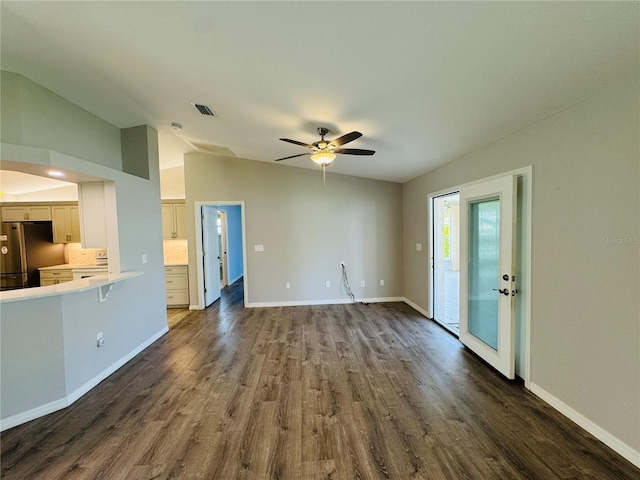 3303 Victory Palm Dr, Edgewater, FL 32141 - unfurnished living room with lofted ceiling, dark wood-style floors, baseboards, and a ceiling fan