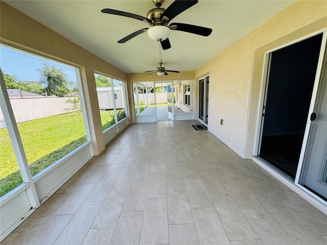 3303 Victory Palm Dr, Edgewater, FL 32141 - unfurnished sunroom featuring ceiling fan