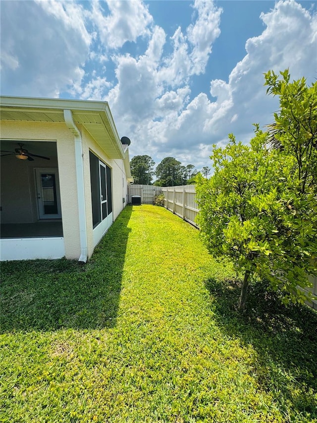 3303 Victory Palm Dr, Edgewater, FL 32141 - view of yard featuring a sunroom
