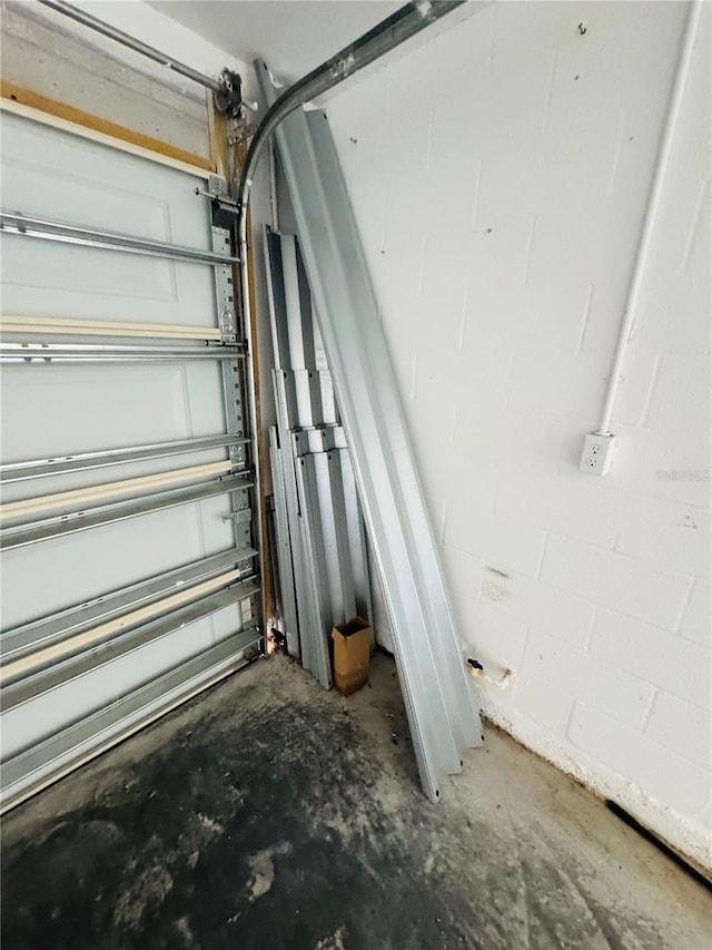 3303 Victory Palm Dr, Edgewater, FL 32141 - garage view of concrete floors and concrete block wall