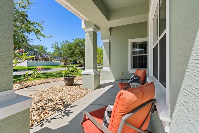 637 Marisol Dr, New Smyrna Beach, FL 32168 - view of patio featuring a porch