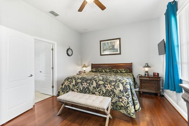 637 Marisol Dr, New Smyrna Beach, FL 32168 - bedroom with wood finished floors and a ceiling fan