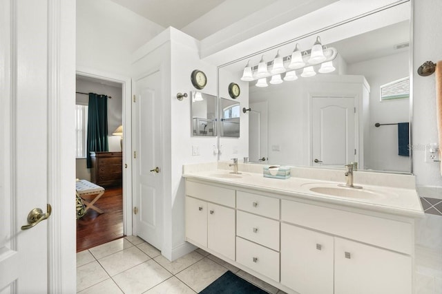 637 Marisol Dr, New Smyrna Beach, FL 32168 - ensuite bathroom with tile patterned flooring and double vanity