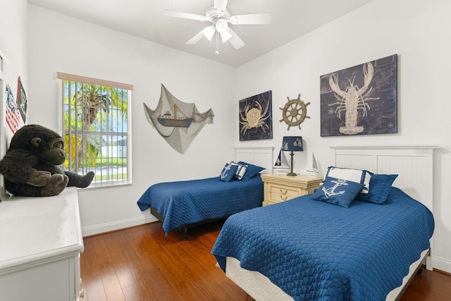 637 Marisol Dr, New Smyrna Beach, FL 32168 - bedroom featuring baseboards, wood finished floors, and a ceiling fan