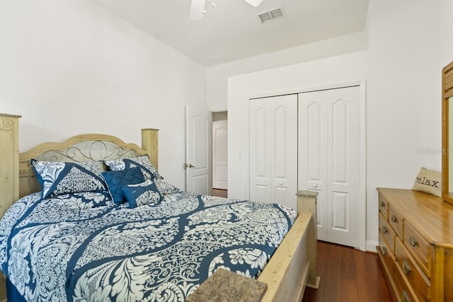 637 Marisol Dr, New Smyrna Beach, FL 32168 - bedroom with dark wood-style flooring, a closet, and ceiling fan