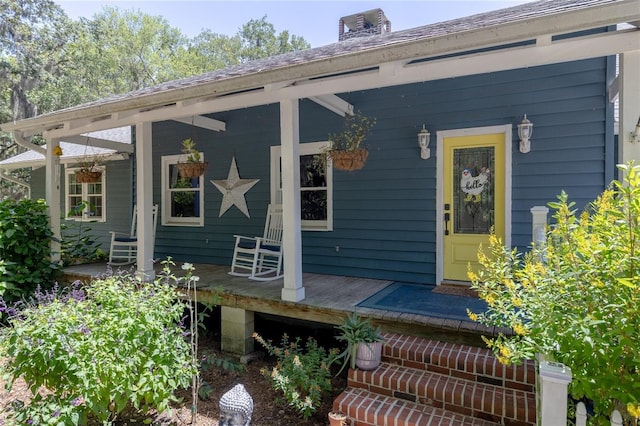 4580 Lake James Cir, Edgewater, FL 32141 - doorway to property with a porch