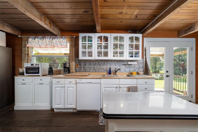 4580 Lake James Cir, Edgewater, FL 32141 - kitchen with white dishwasher, a sink, wood ceiling, beam ceiling, and healthy amount of natural light