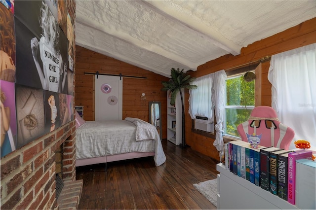 4580 Lake James Cir, Edgewater, FL 32141 - bedroom featuring lofted ceiling, wooden walls, wood-type flooring, a barn door, and cooling unit