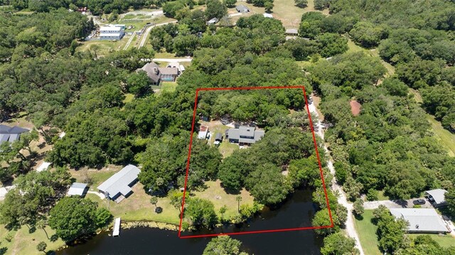 4580 Lake James Cir, Edgewater, FL 32141 - aerial view of property and surrounding area with a large body of water and property boundaries highlighted