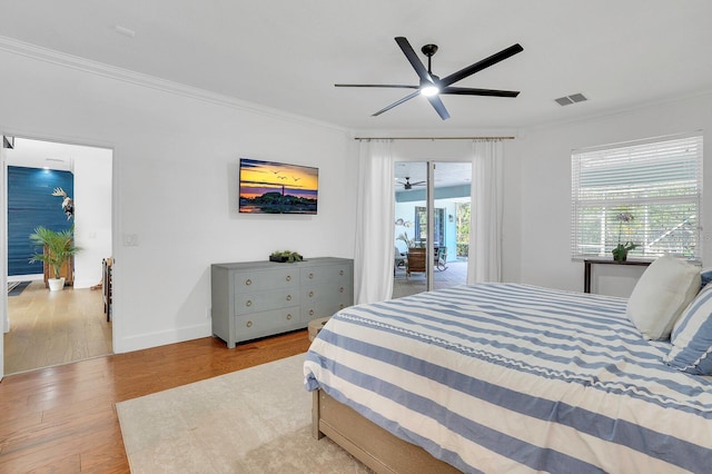bedroom with crown molding, access to exterior, wood finished floors, baseboards, and ceiling fan