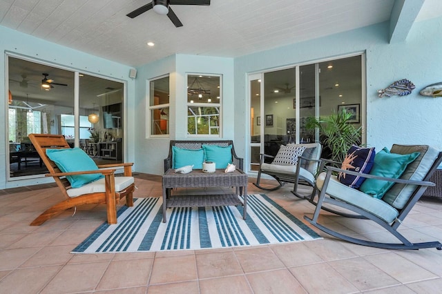 view of patio featuring ceiling fan and an outdoor hangout area