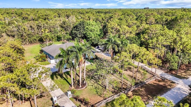 view from above of property featuring a forest