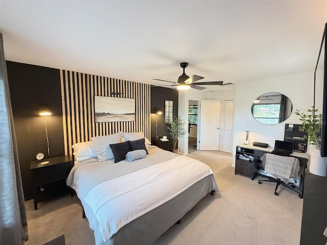 208 Wellington Dr, Daytona Beach, FL 32119 - bedroom featuring light colored carpet, multiple windows, ceiling fan, and a closet