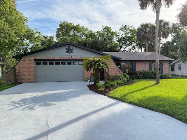 208 Wellington Dr, Daytona Beach, FL 32119 - ranch-style home with brick siding, concrete driveway, a front yard, and a garage