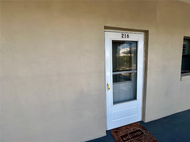 2100 N Peninsula Ave Unit 2160, New Smyrna Beach, FL 32169 - view of exterior entry with stucco siding