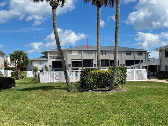 2100 N Peninsula Ave Unit 2160, New Smyrna Beach, FL 32169 - rear view of house with stucco siding